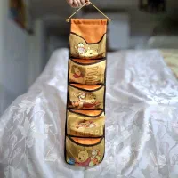 آویز پارچه‌ای برای نظم‌دهی وسایل شخصی