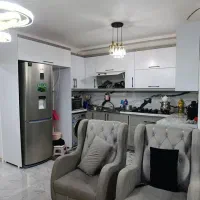 آپارتمان نوساز دوخواب کرسی‌دار با حیاط