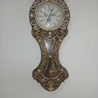ساعت دیواری ودودست وسیله اشپزخونه
