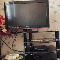 تلویزیون ال جی به همراه میز وگیرنده
