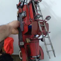 ماشین اتش نشان دست ساز فلزی  و رادیو صبط سانیو