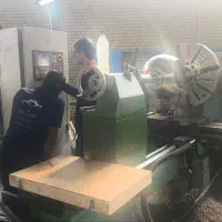 برنامه نویس دستگاه تراش CNC