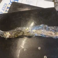 تعدادی کمربند زنانه و دکمه زیر قیمت