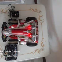 ماشین شارژی۲موتوره کنترل دار آداپتور باطری وغیره|اسباببازی|تهران, تهرانسر غربی|دیوار