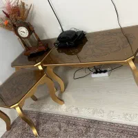 سه عدد میز طلایی رنگ