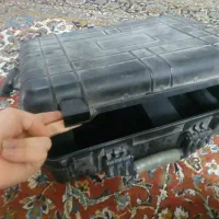 چمدون برای حمل بار و عکاسی برای تولید محتوا