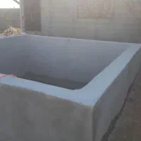 سیمانکاری دیوار چینی سنگ کاری انجام داده میشود