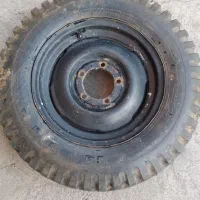 رینگ و لاستیک فابریک جیپ ۶۰۰/۱۶ دنا در حد نو