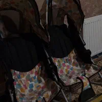 کالسکه دو قلو عصایی