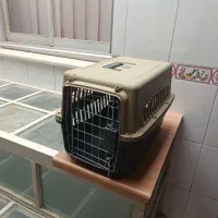 تعدادی وسایل سگ و گربه معاوضه با کیف حمل حیوان