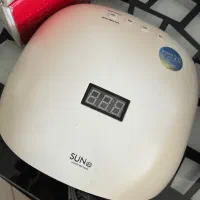دستگاه uv ناخن و کیف لوازم ناخن