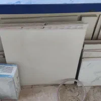 مقداری کاشی،سرامیک،گچ،سیمان، اضافه از بازسازی