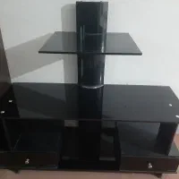 میز تلویزیون شیشه‌ای