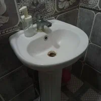 روشویی و شیر آب