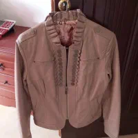 کاپشن چرمی  نو و بارونی