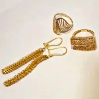 انگشتر و گوشواره طلا ۲۰۰ بالای تابلو