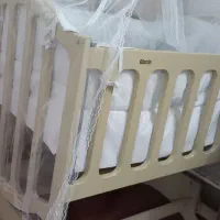 گهواره کنارمادرکاملانو