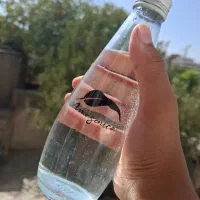 بطری آب شیشه ای|ظروف نگهدارنده، پلاستیکی، یک‌بارمصرف|مشهد, حرم مطهر رضوی|دیوار