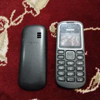 قاب گوشی نوکیا و کفش اسپرت پسرانه و بلیز