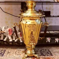 سماور برنجی ذغالی تبریزی خرید ۲۵ سال قبل نیم متری|صنایع دستی و سایر لوازم تزئینی|قم, باجک یک|دیوار