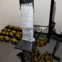 دستگاه بدنسازی ۱۲کاره به همراه دمبل هالتر میله