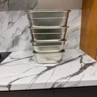 تعدادی آبکش و لگن استیل