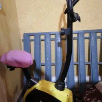 دوچرخه ثابت ورزشی و صندلی  همراه