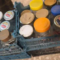 شیشه خالی تمیزوقوطی شیرخشک تمیز