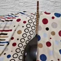 تنبور یک تیکه از چوب توت|سازهای سنتی|کنگاور, |دیوار