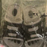 دمپایی|کیف، کفش، کمربند|قم, باغ شازده|دیوار