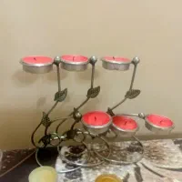 تعدای شمعدانی جاشمعی فلزی فرفورژه خیلی ظریف و شیک