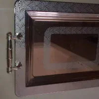 ساعت دیواری و سینی