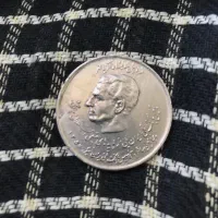 سکه ۲۰ ریالی معروف دو چهره دوران پهلوی