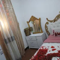 تخت خواب و میز ارایشی