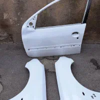 گلگیرهای جلو ۲۰۶ و درب جلو سمت راننده رنگ سفید