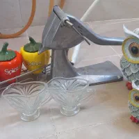 آب نارنج گیری و جا ادویه و مجسمه