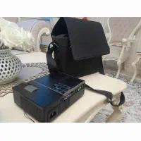 ویدیو پروژکتور و دوربین عکاسی