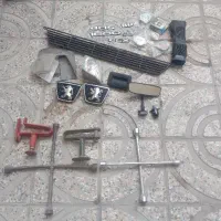 لوازم یدکی ،آچار چرخ ، آرم پژو ،پیکان،درب رادیاتور