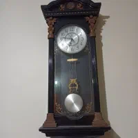 ساعت دیواری چوبی شیک