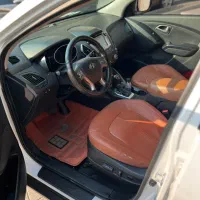 توسان 2014 سفید بدون رنگ|خودرو سواری و وانت|تهران, درختی|دیوار