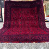 فرش دستبافت 12متری نقش بخارایی رنگ لاکی گیاهی