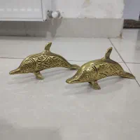 دکوری دلفین ساعت و.. برنجی