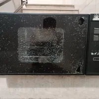 اون توستر شیشه شکسته