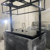 شیشه ضدگلوله با  گاوصندوق اسانسوری وهالوژن