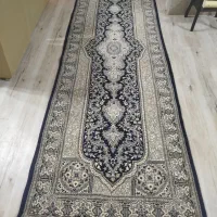 یک تخته قالی کناره ستاره کویر در ابعاد  در سه متر