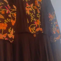 تعدادی مانتو و لباس دخترانه