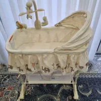 گهواره کنار تخت کودک