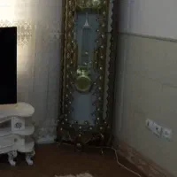 ست ساعت ایستاده و ویترین برنزی