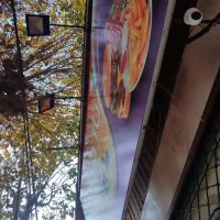 تابلو بالای مغازه فلزی