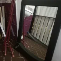 آینه بزرگ و جا لباسی فلزی